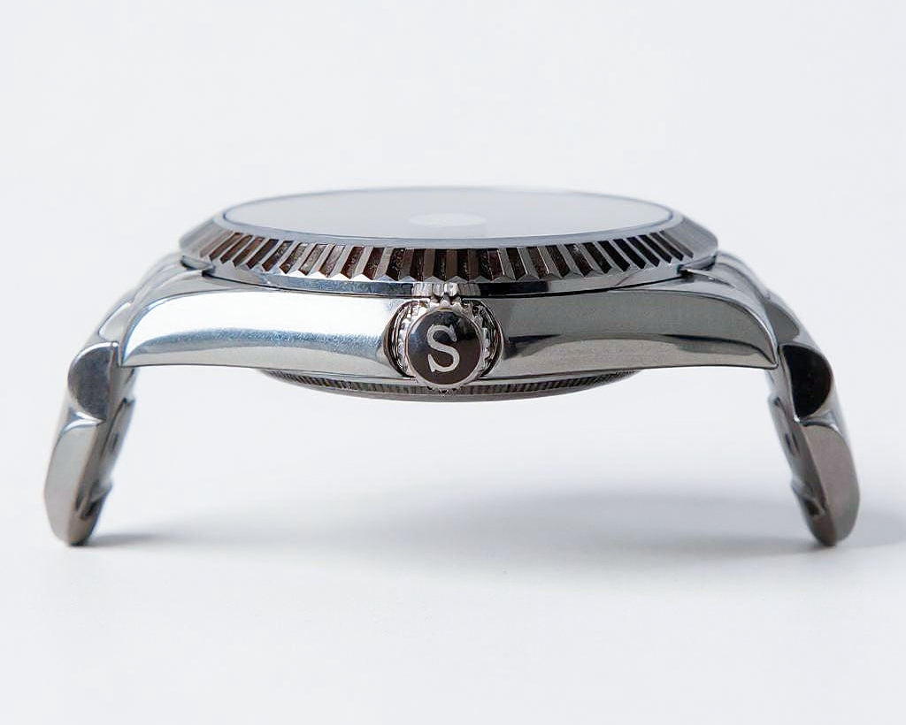 Silver watch case with brand logo on a white background