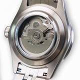 Close-up of a watch automatic mechanism on a white background